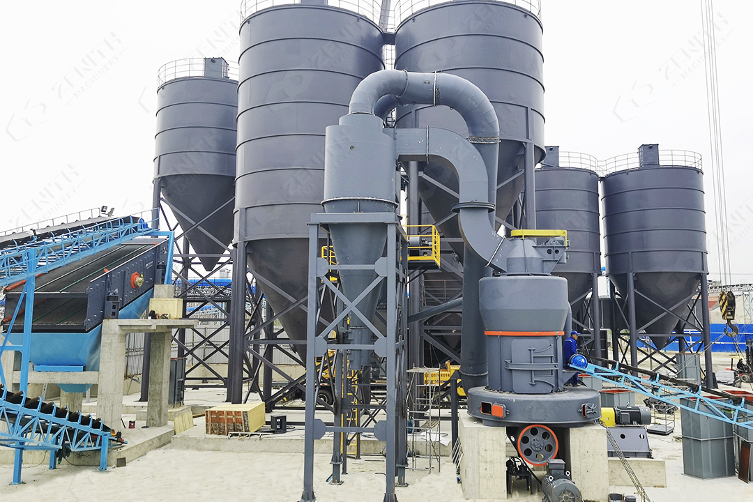 Technician inspecting grinding mill components before no-load test
