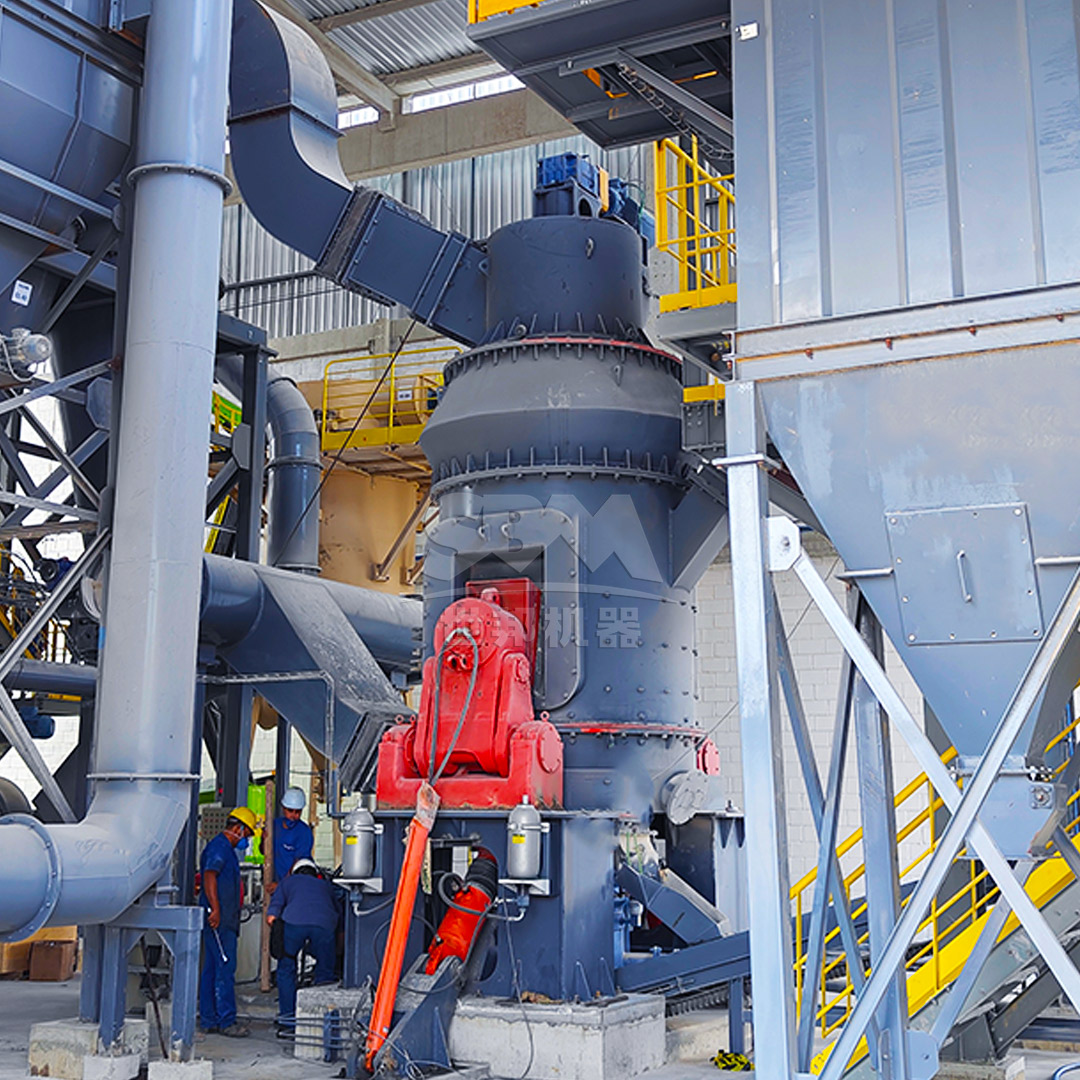 A large-scale industrial plant installation showing multiple vertical grinding mills operating in a clean, modern facility.