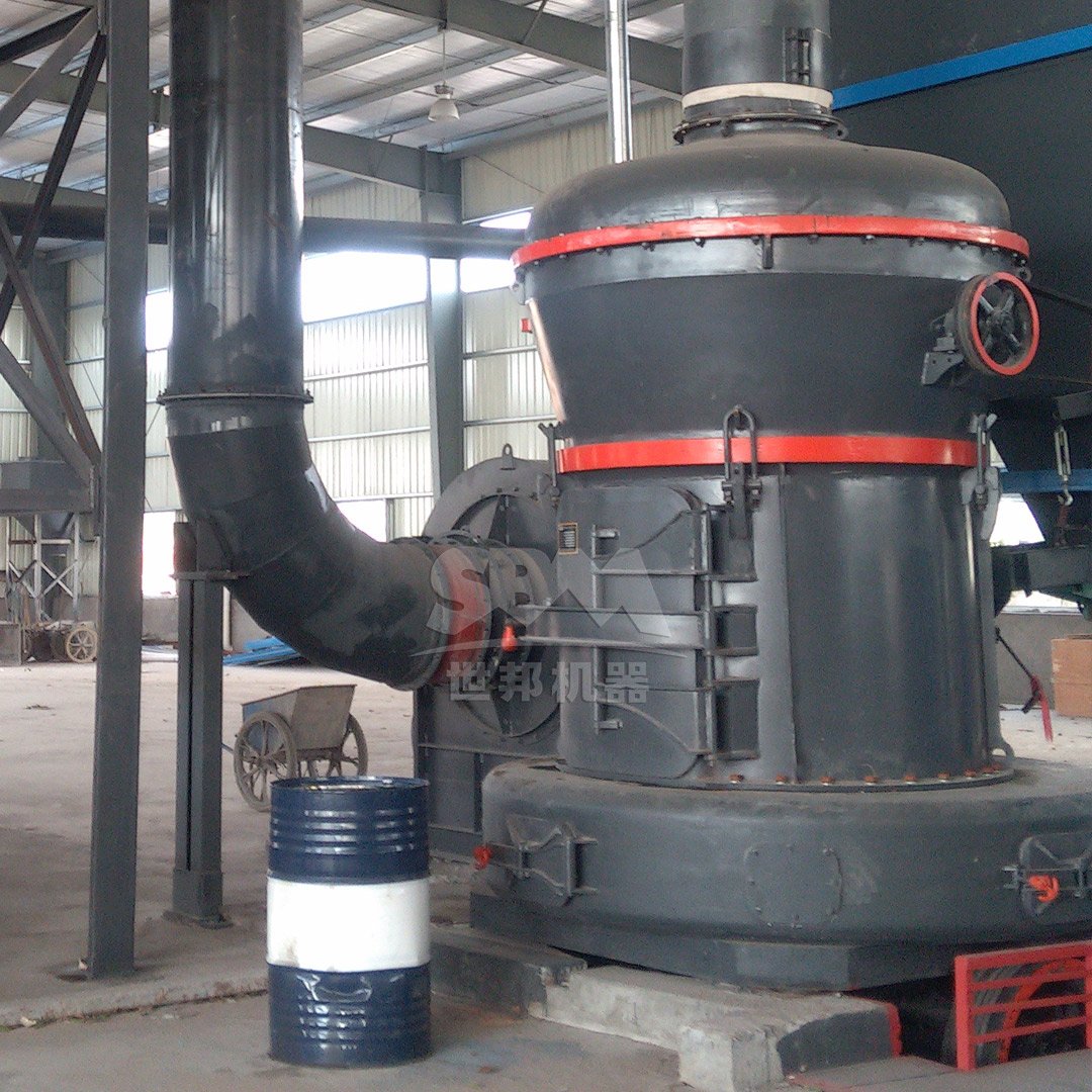 A modern calcite processing plant with grinding mills and dust collection systems in operation.