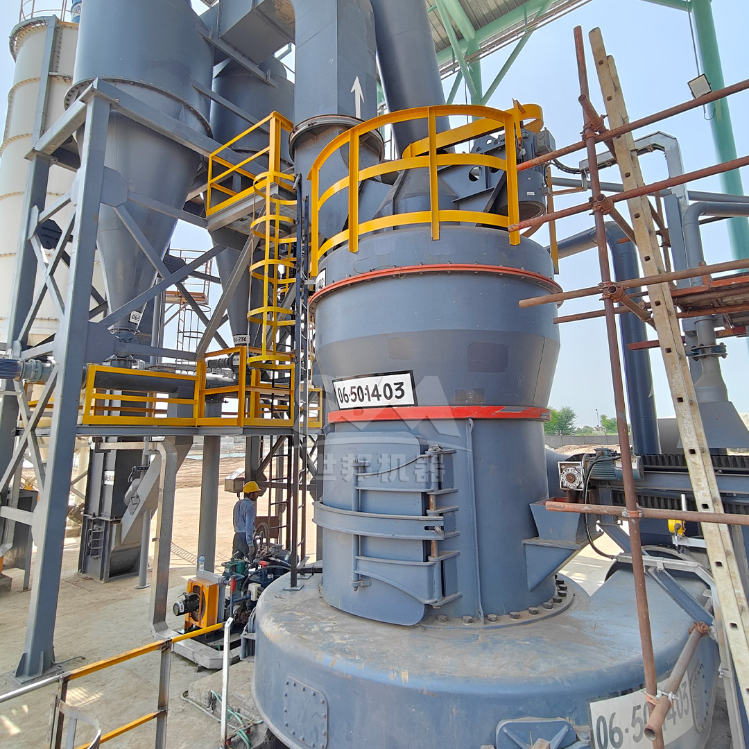 Heap of dark grey Manganese Powder with varying particle sizes, showcasing its fine, granular nature.