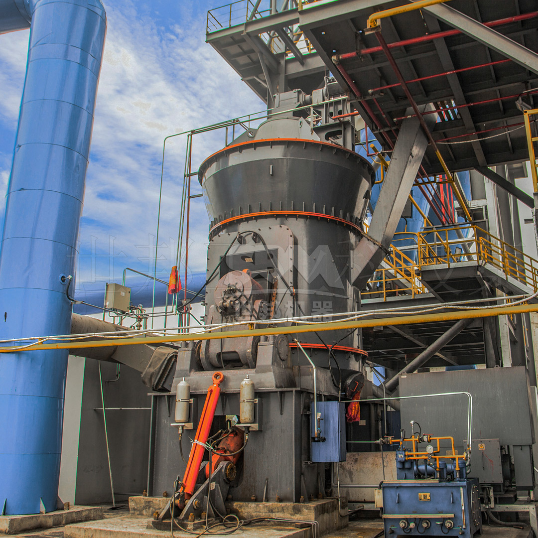 External view of a large LM Series Vertical Roller Mill installation in an industrial setting.