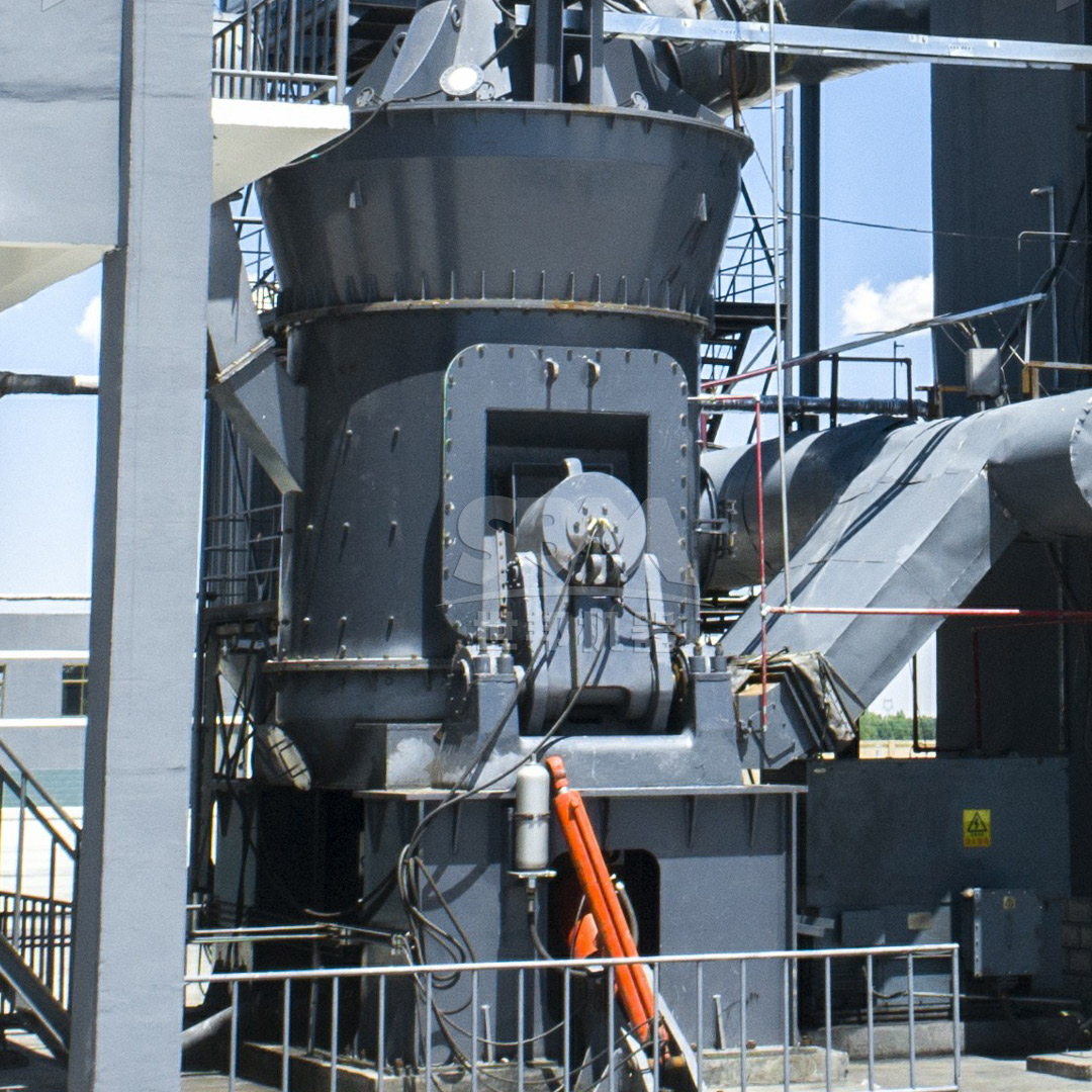 Ultra-fine slag powder being discharged into a large storage silo from a collection system.