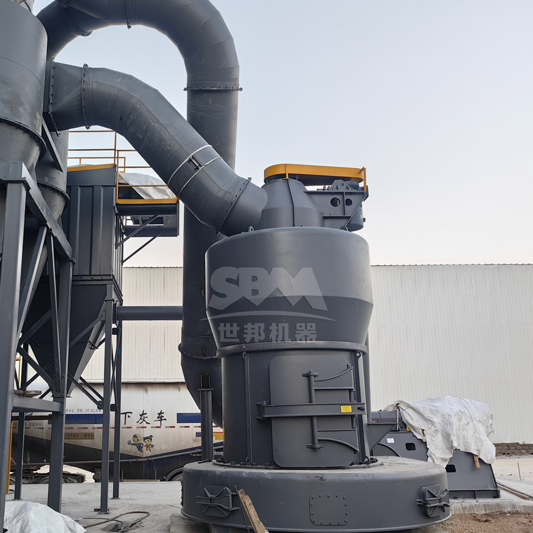 An industrial installation of an MTW Series European Trapezium Mill for grinding natural minerals like graphite.