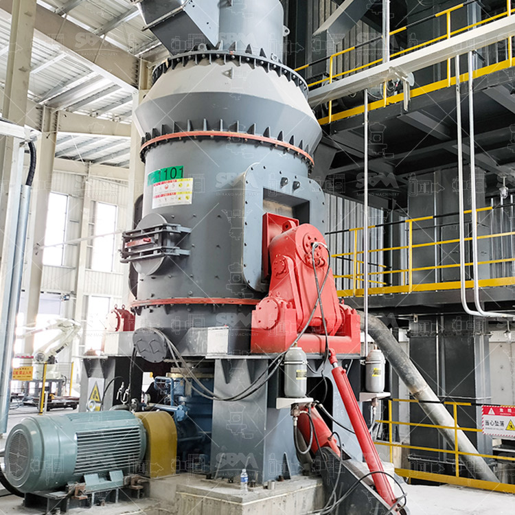 Petroleum coke vertical mill grinding mechanism showing material layer between rollers and table