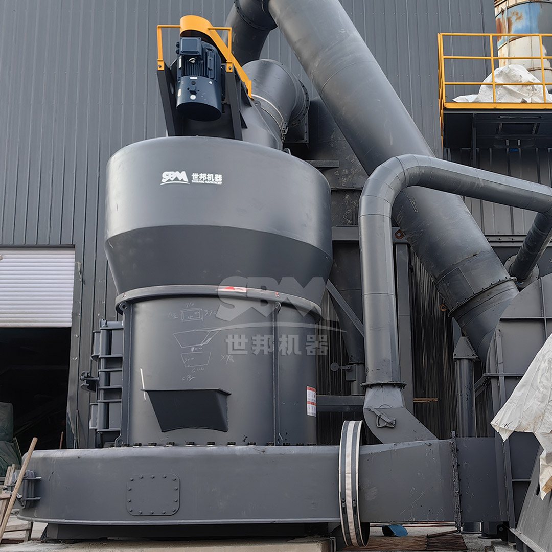 Industrial milling equipment processing coal gangue inside a factory